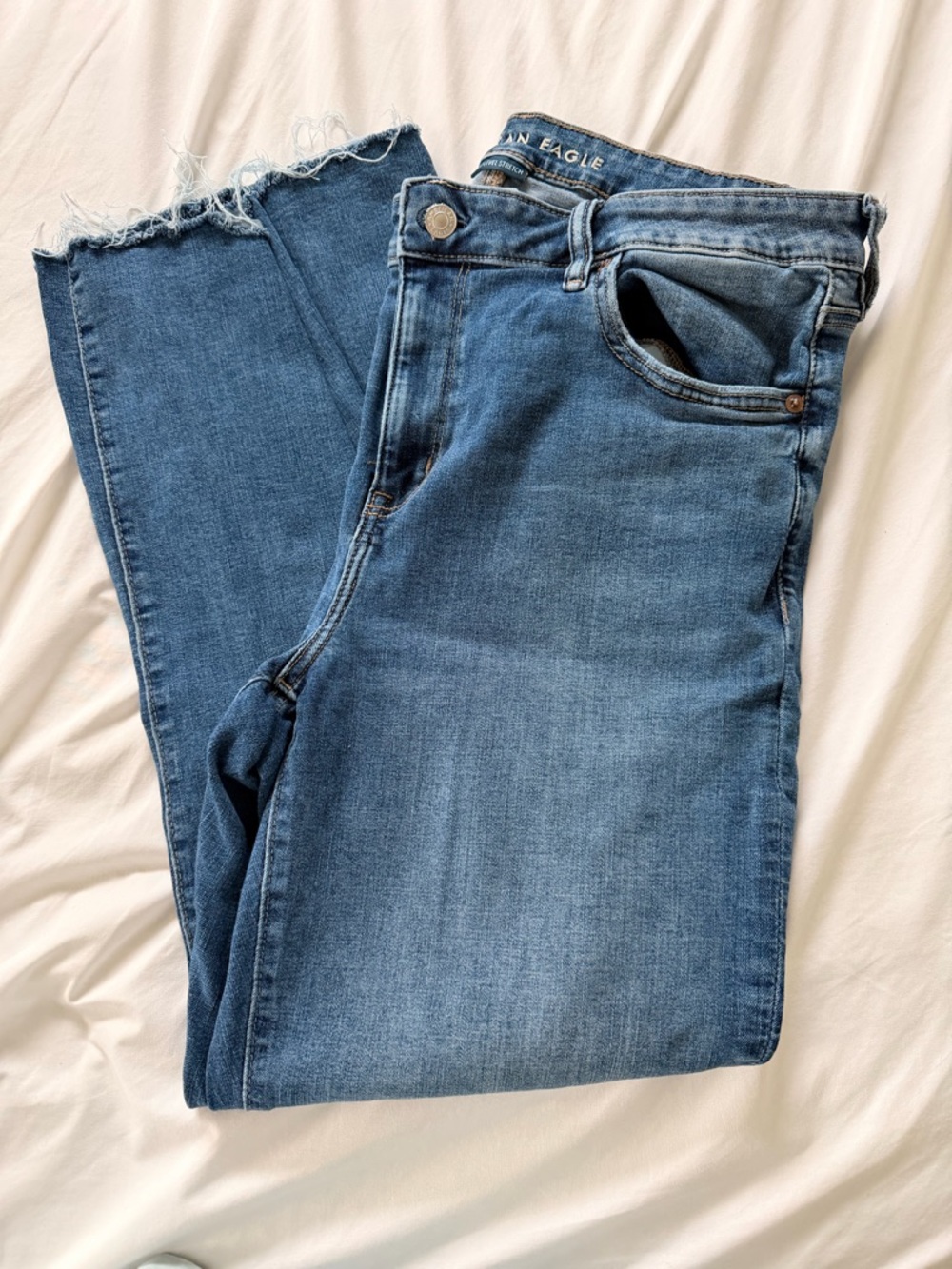 American Eagle Outfitters Medium Blue Frayed Hem Jeans